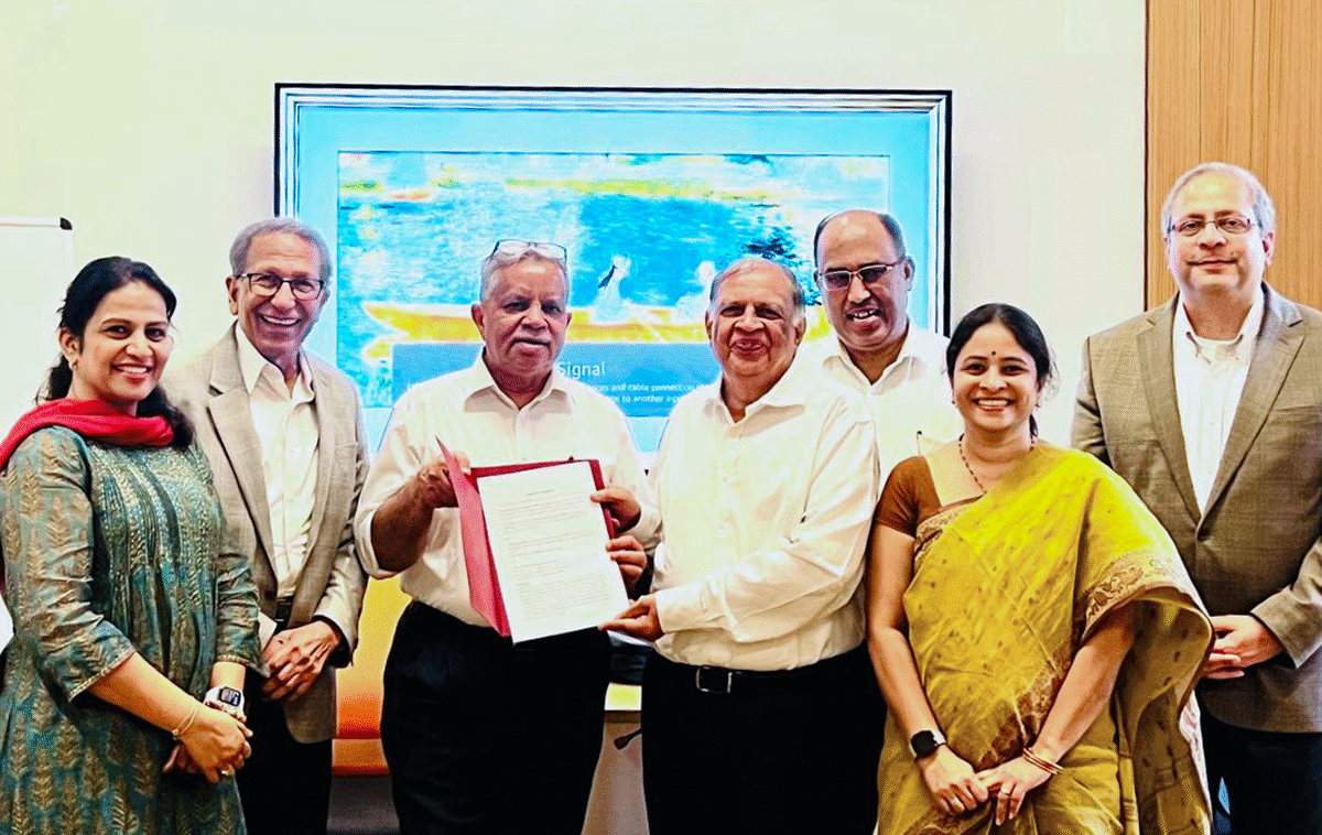 Guru Ghosh (at right), vice president for outreach and international affairs, joined partners from Virginia Tech India and Mahindra University — (from left) Priya Goutham, Roop Mahajan, Yaj Medury, Myoor Padmanabhan, Arya Kumar Bhattacharya, and Visalakshi Talakokula — to inaugurate the new center with a signing ceremony. Photo courtesy of Priya Goutham.